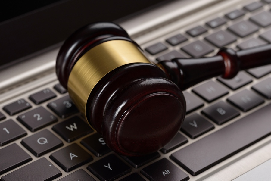 bigstock-Gavel-On-Laptop-80866847.jpg